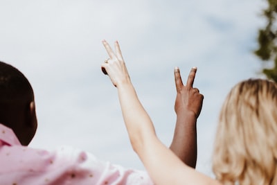 An image featuring diverse individuals of different genders standing on an equal platform, symbolizing the move towards gender equality in bankruptcy proceedings